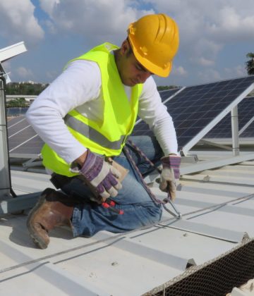 Solar Safety -Worker tying himself